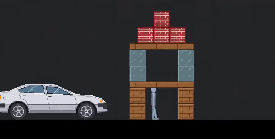 A car beside a tower of wood, glass, and bricks in Playmatter.